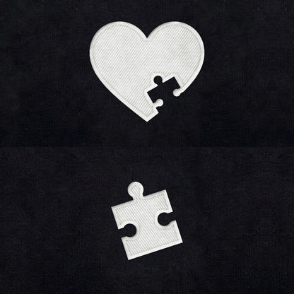 Duo Cœur et puzzle : broderie de près