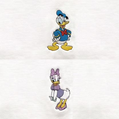 Duo Donald et Daisy : broderie de près