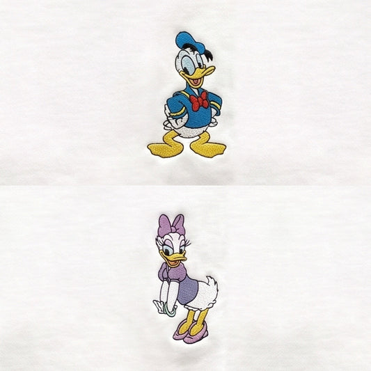 Duo Donald et Daisy : broderie de près