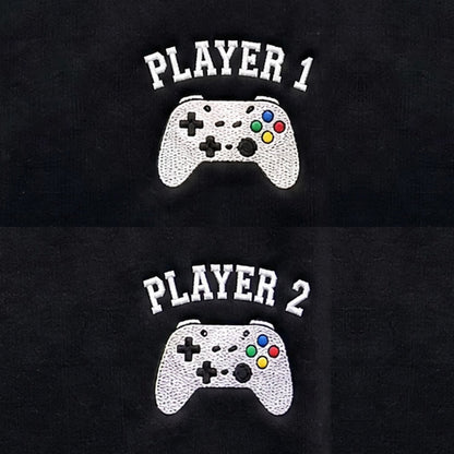 Duo Joueur 1 et Joueur 2 : broderie de près