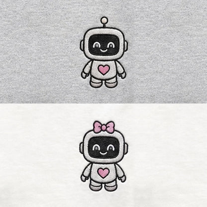 Duo Robots amoureux : broderie de près