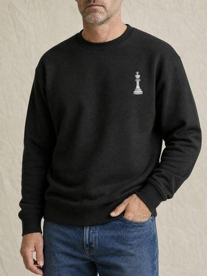 Broderie Roi d'échecs sur le pull noir, côté cœur