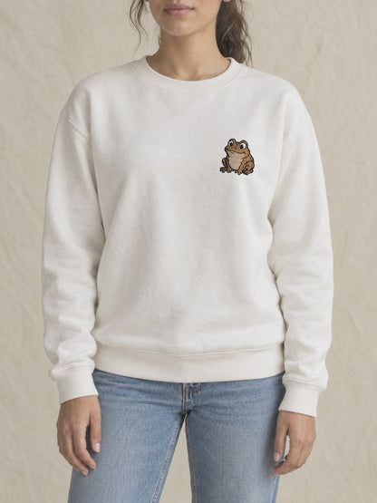Broderie Crapaud sur le pull blanc, côté cœur