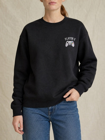 Broderie Joueur 2 sur le pull noir, côté cœur