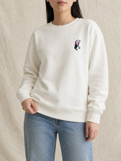 Broderie Gwen sur le pull blanc, côté cœur